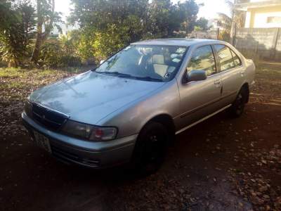 Voiture NISSAN B14 a vendre - Family Cars