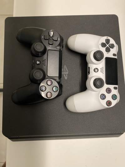 PlayStation 4 with 2 controllers  - All electronics products on Aster Vender