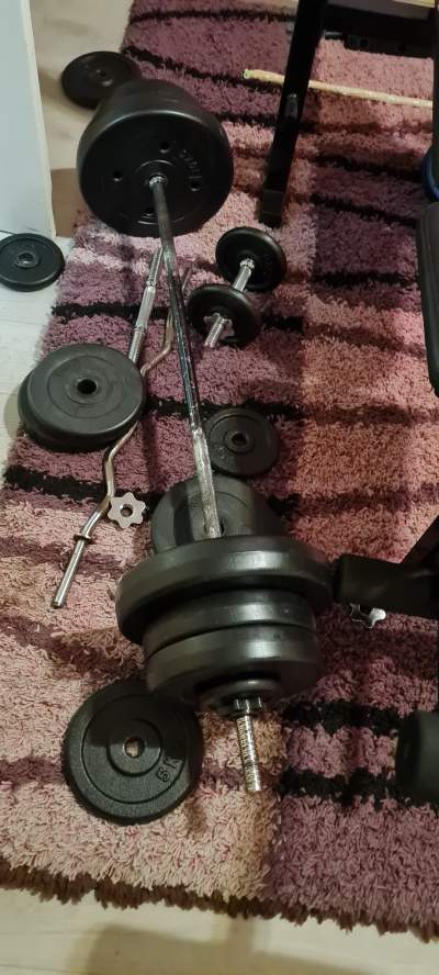 Gym bench, rods, barbell,  weight plates - Fitness & gym equipment on Aster Vender