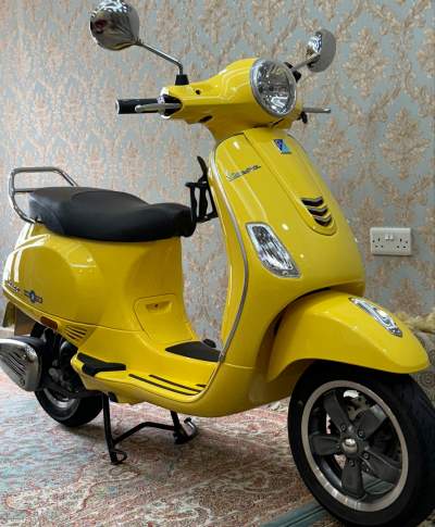 Yellow / Red Vespa 2024 in Excellent Condition Like New - Scooters (above 50cc) on Aster Vender