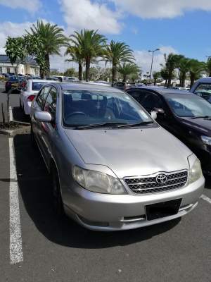 Toyota Corolla NZE Year 2002 / Silver color for sale - Family Cars on Aster Vender