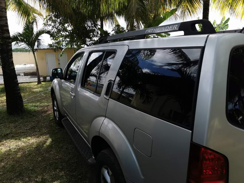 Nissan Pathfinder - 7 - Passenger Van  on Aster Vender