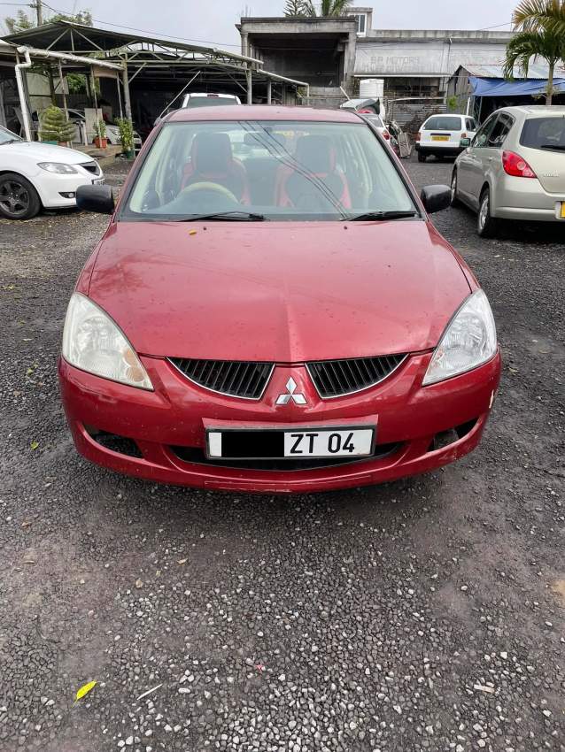 Mitsubishi Lancer Year 04 Rs 165,000 a deb  in good condition  1600 cc - 4 - Family Cars  on Aster Vender