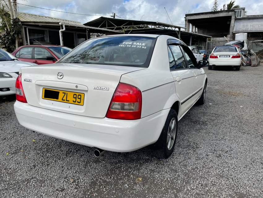 Mazda Familia Year 99  - 3 - Family Cars  on Aster Vender