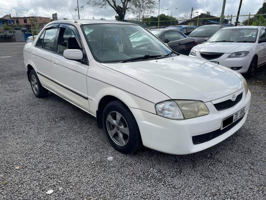 Mazda Familia Year 99  - 1 - Family Cars  on Aster Vender