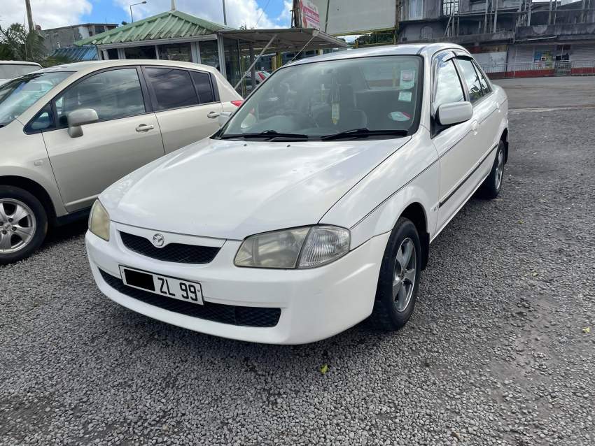 Mazda Familia Year 99  - 2 - Family Cars  on Aster Vender