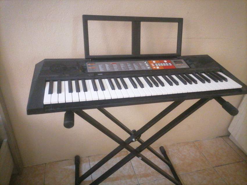 Yamaha PSR-F50 61-key Portable+ Stand - 0 - Electronic piano  on Aster Vender