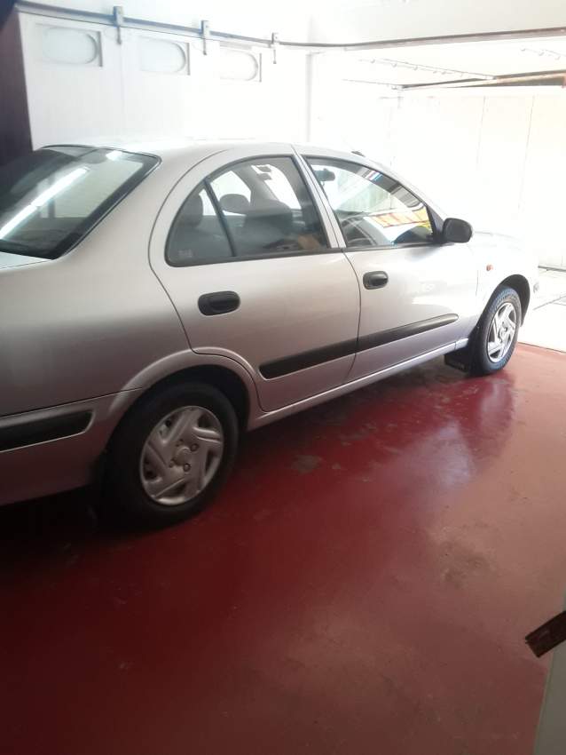 Nissan Sunny 2003 - 1 - Family Cars  on Aster Vender