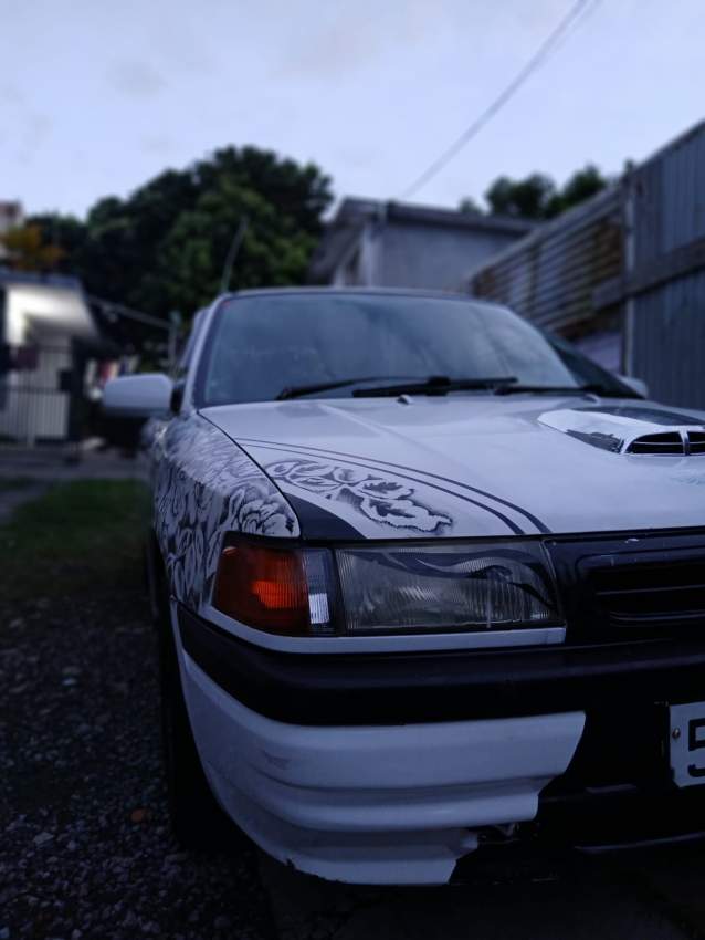 Mazda 323 (ZG 94) - 5 - Compact cars  on Aster Vender