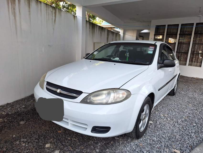 Chevrolet optra - 2 - Compact cars  on Aster Vender