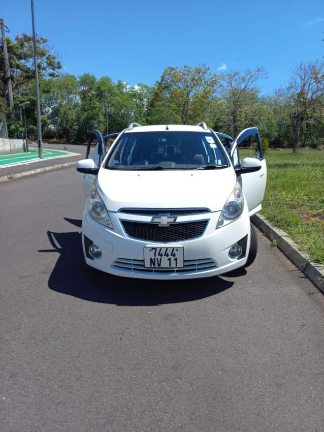 Chevrolet Spark 2011 - 3 - Family Cars  on Aster Vender