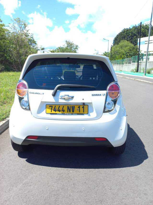 Chevrolet Spark 2011 - 1 - Family Cars  on Aster Vender