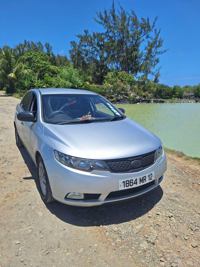 Kia Cerato 2012 - 1 - Family Cars  on Aster Vender